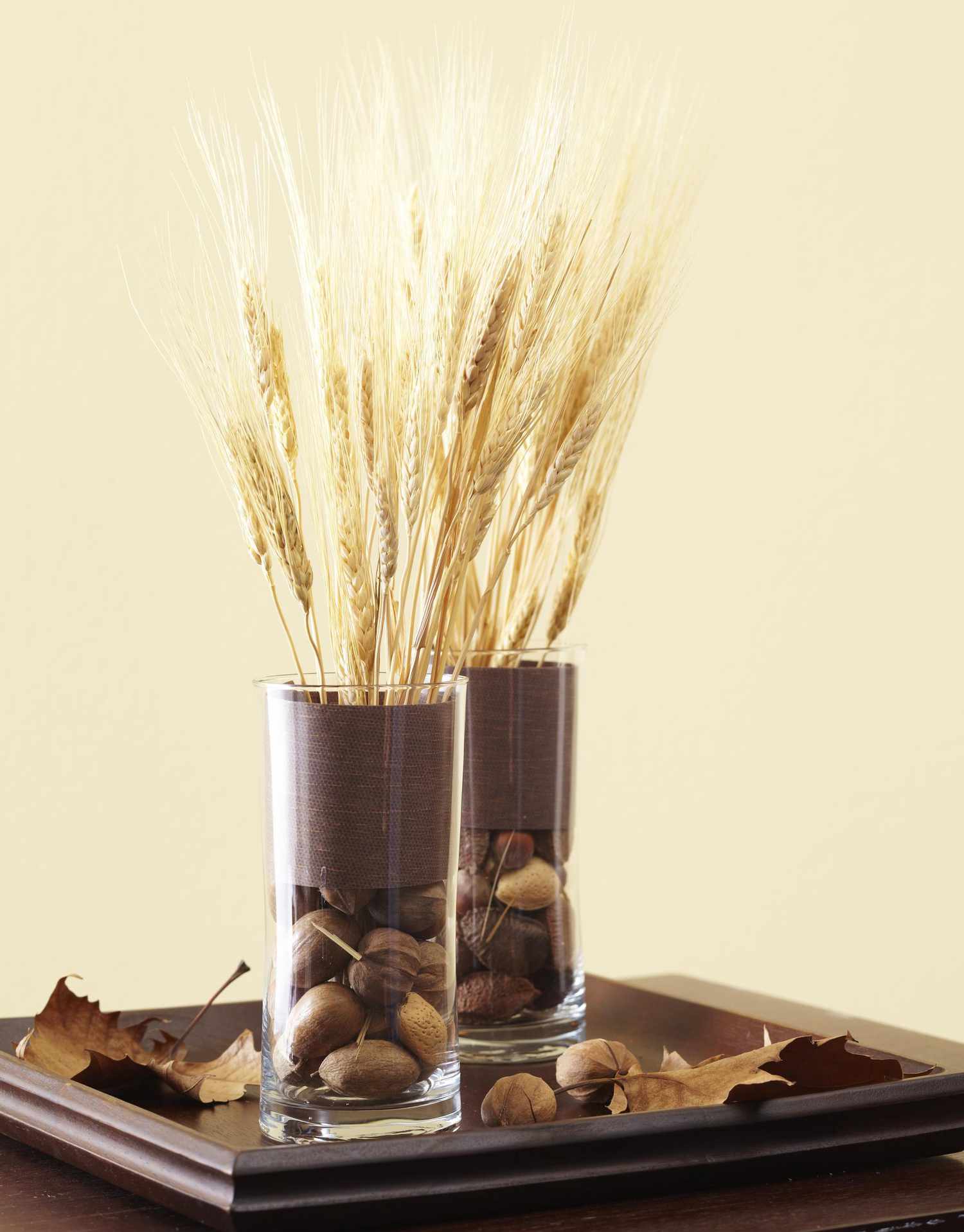 Harvest vases with nuts and leaves