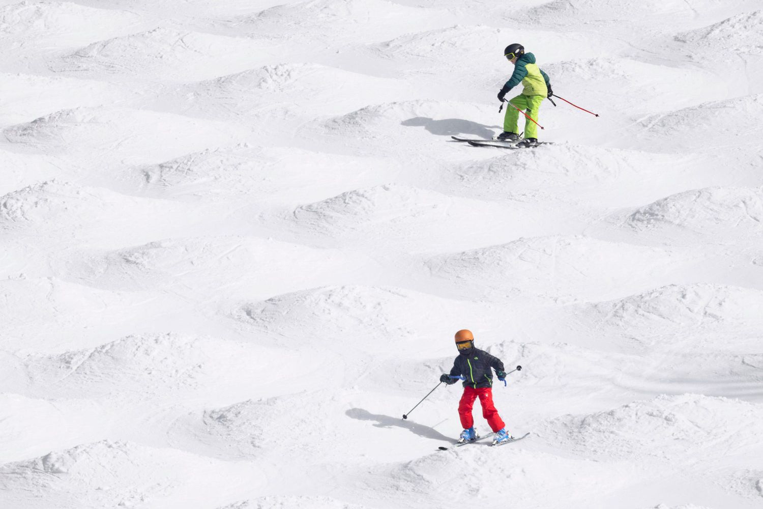 Two skiers at Lutsen Mountains