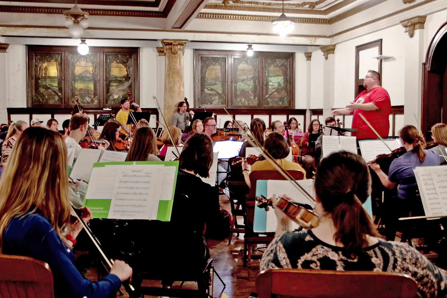 Community symphony members practicing